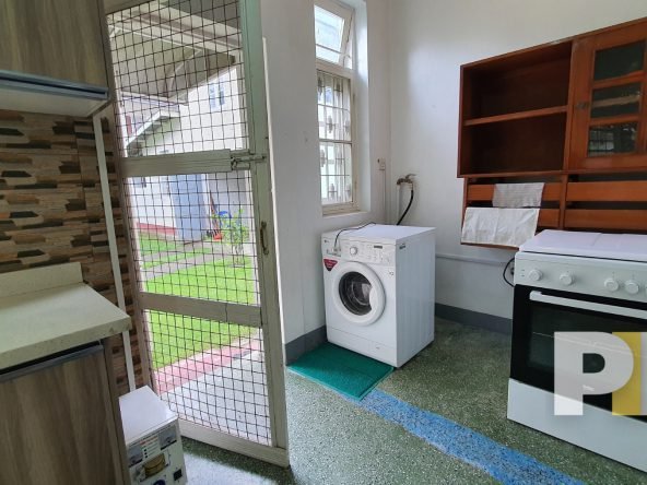 laundry space with washing machine - Yangon Property