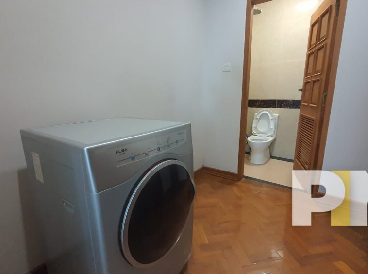 laundry space with washing machine - Yangon Real Estate