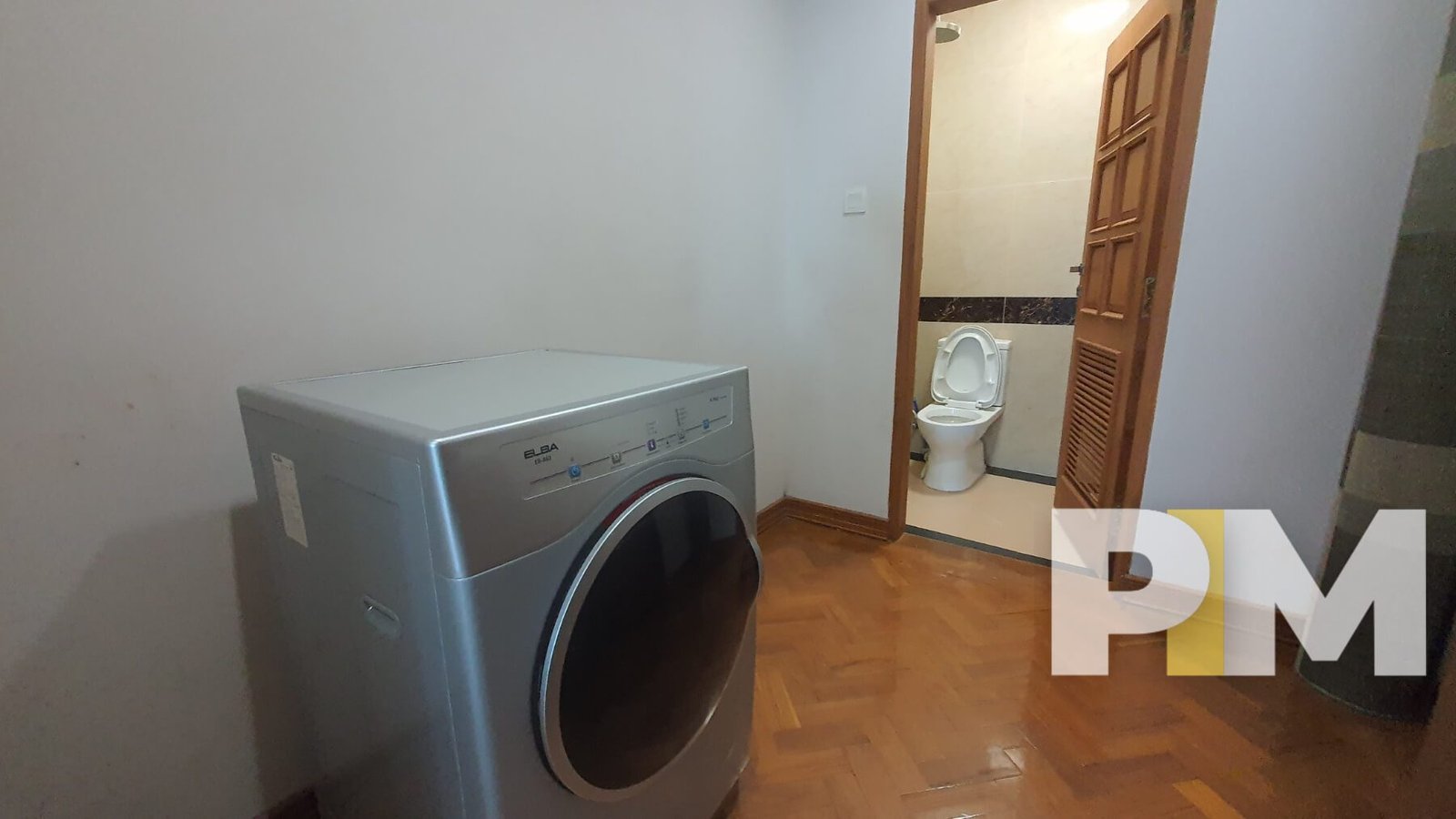 laundry space with washing machine - Yangon Real Estate