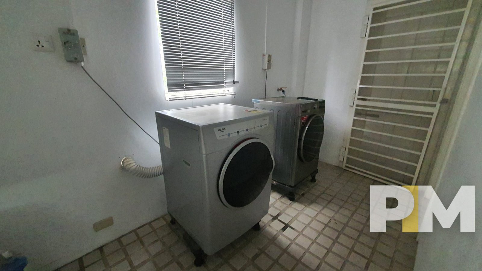 laundry space with washing machine - properties in Yangon
