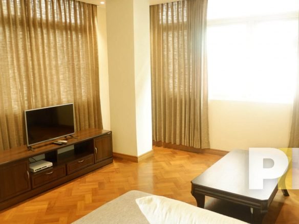 living room with TV - Condo for rent in Kyimyindine