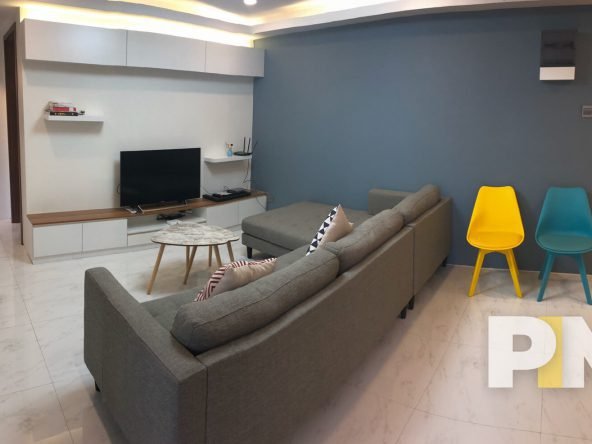 living room with TV - Home Rental Yangon