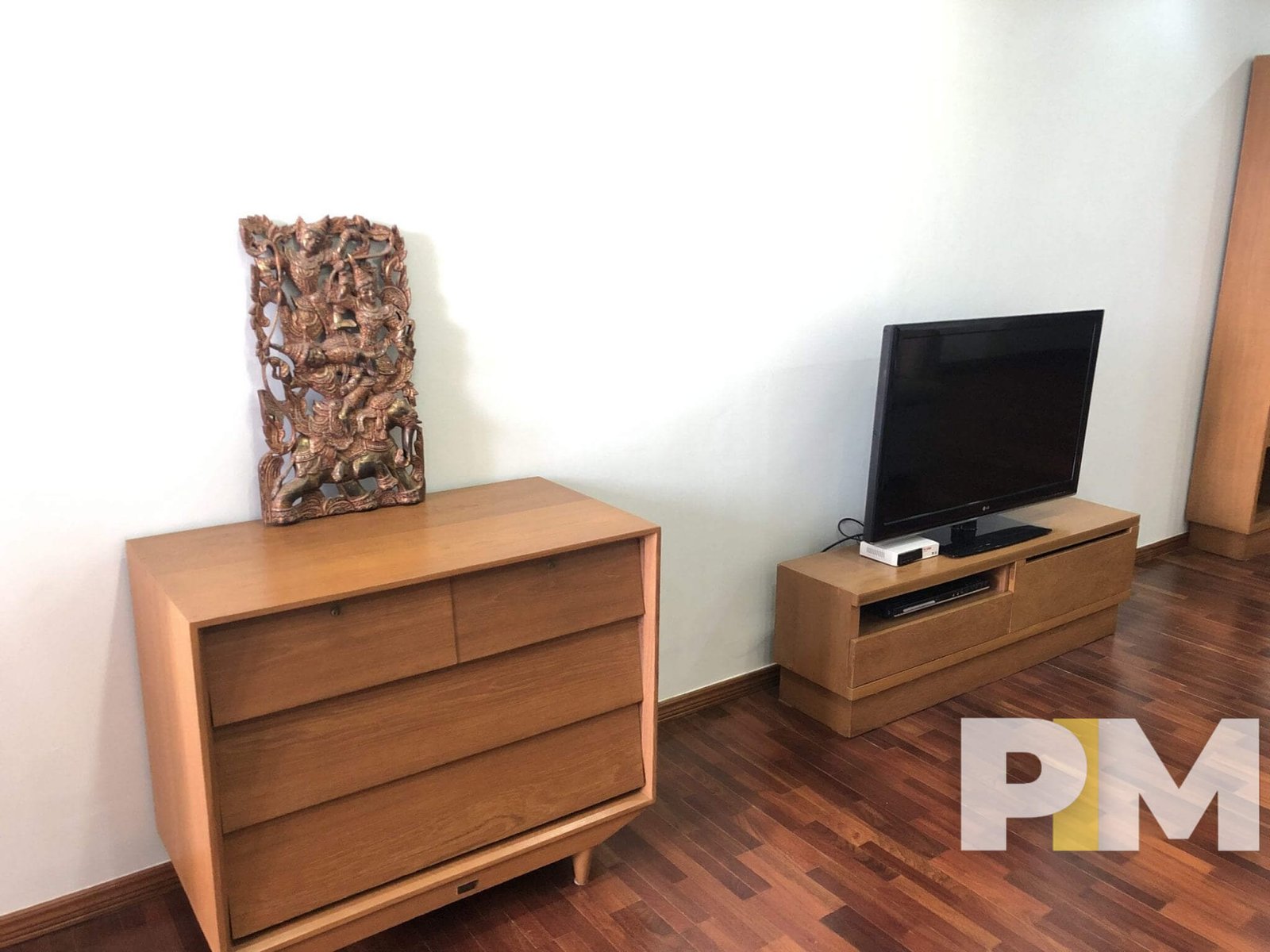 living room with TV - Home Rental Yangon