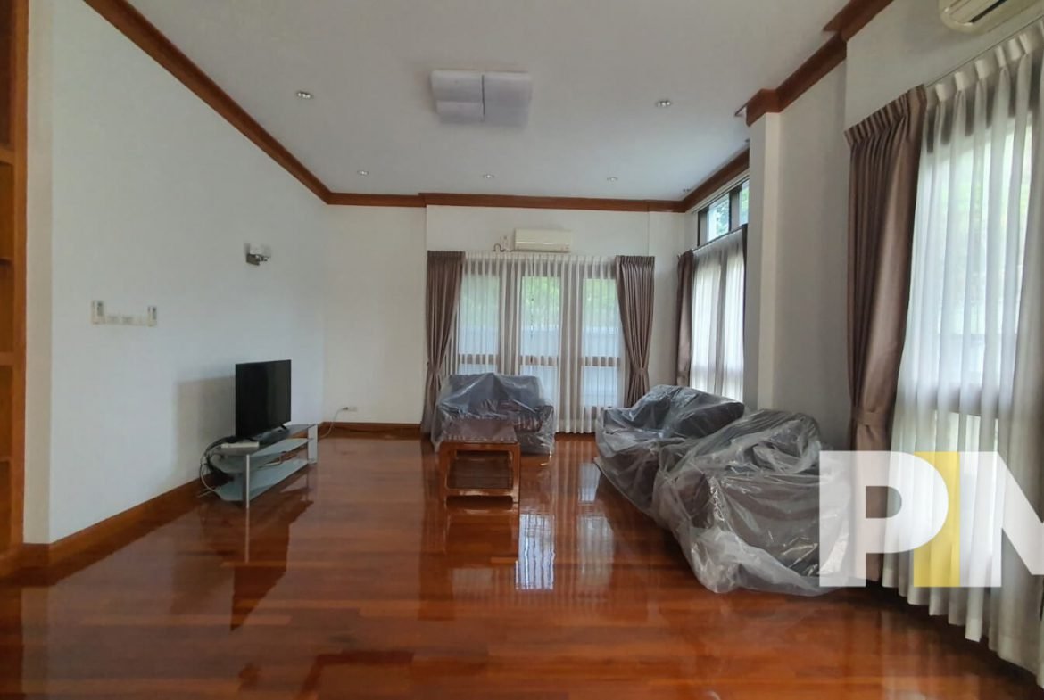 living room with TV - Home Rental Yangon