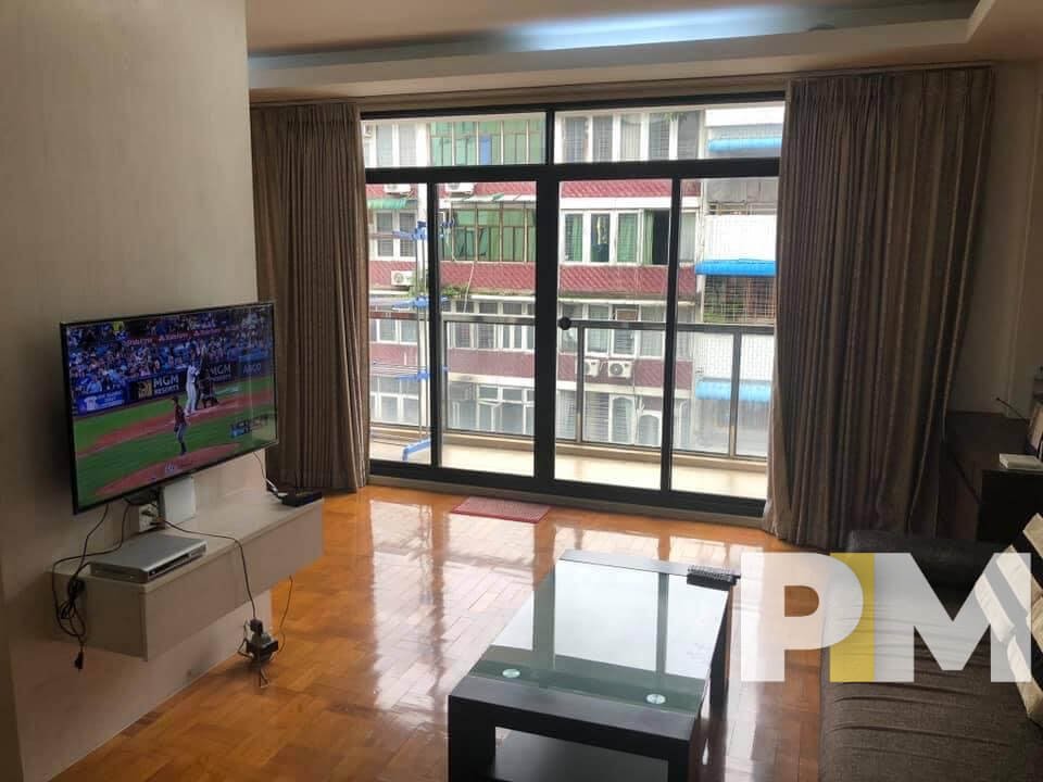 living room with TV - properties in Yangon