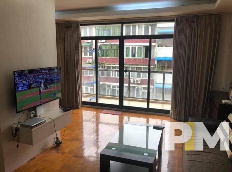 living room with TV - properties in Yangon