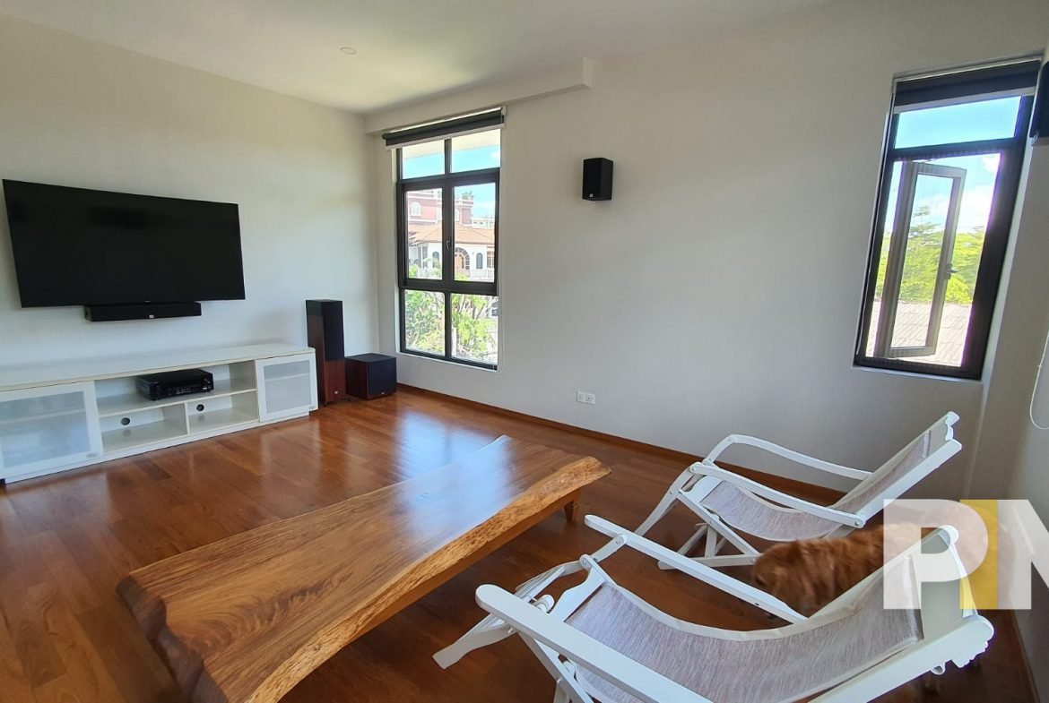 living room with TV - properties in Yangon