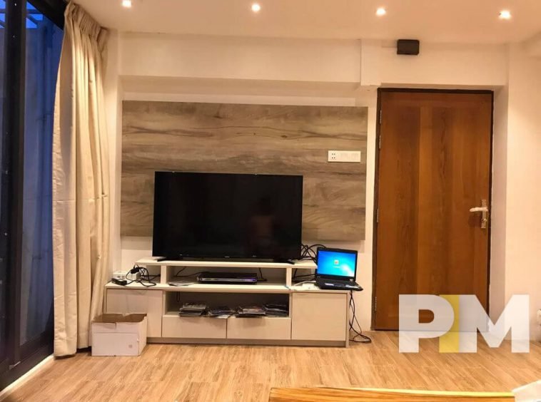 living room with TV - property in Yangon