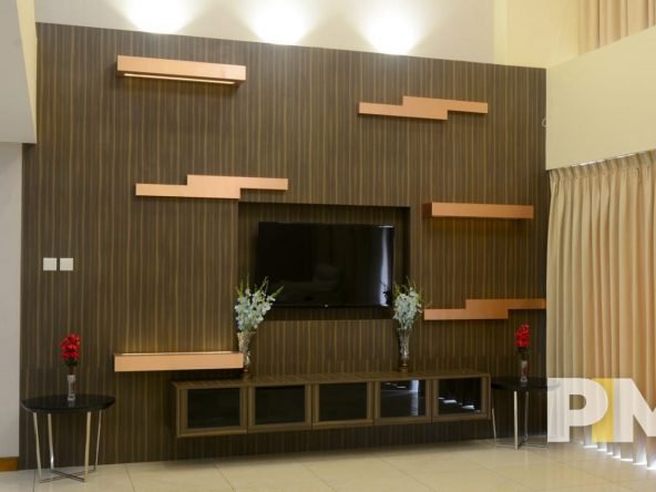 living room with TV - proproties in Yangon