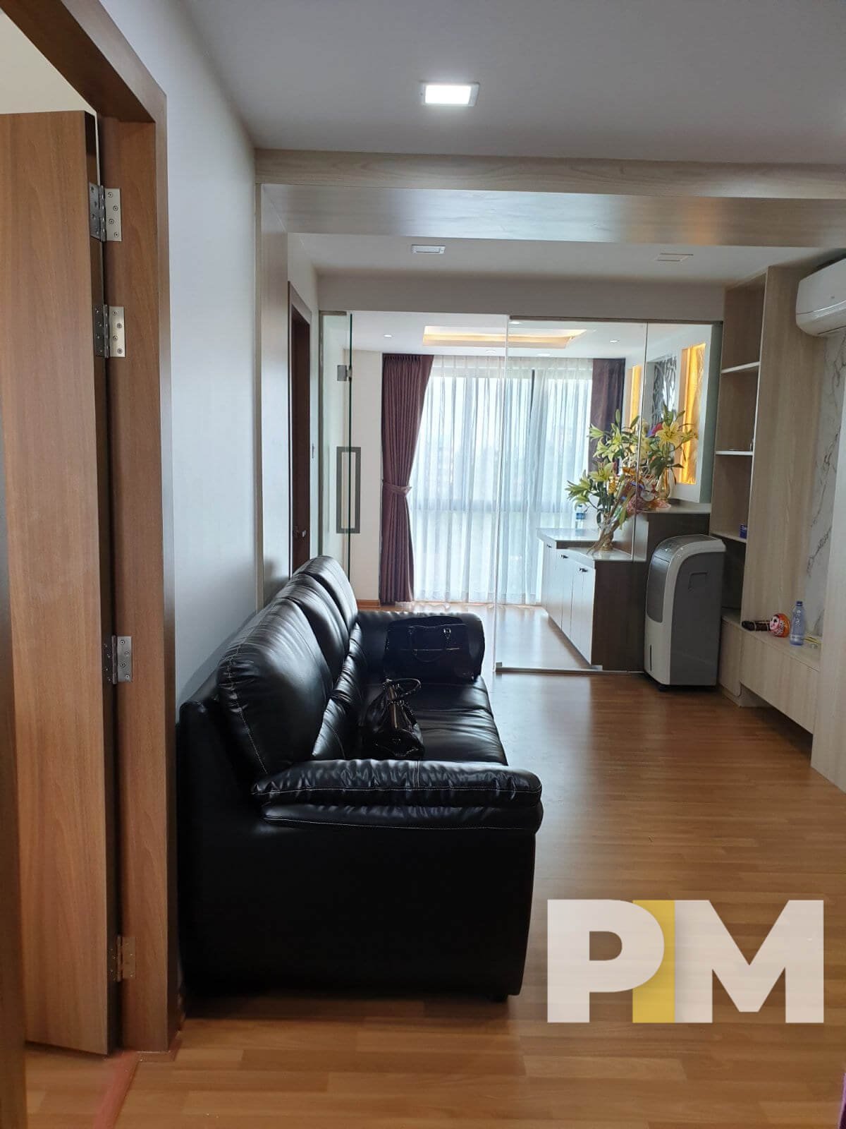living room with air conditioner - Yangon Real Estate