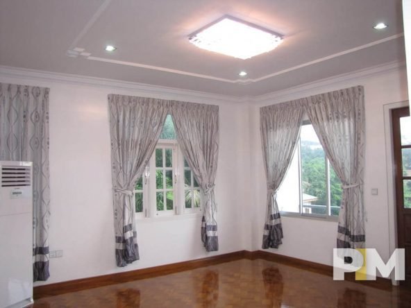 living room with air conditioning - Real Estate in Myanmar