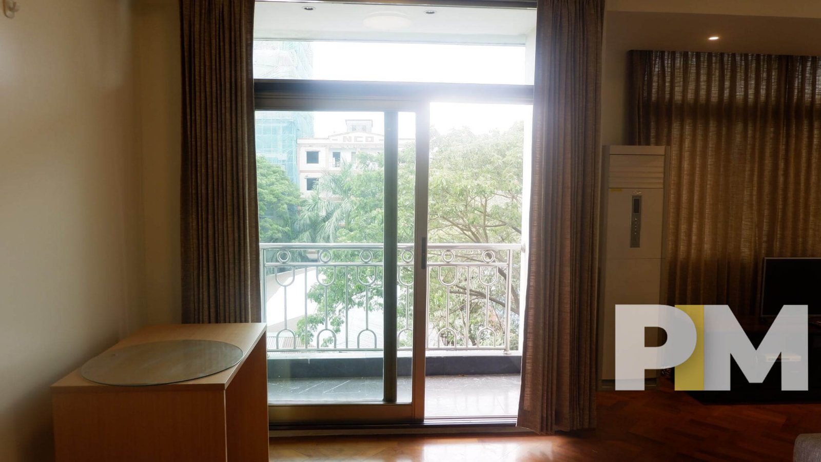 living room with balcony - properties in Yangon