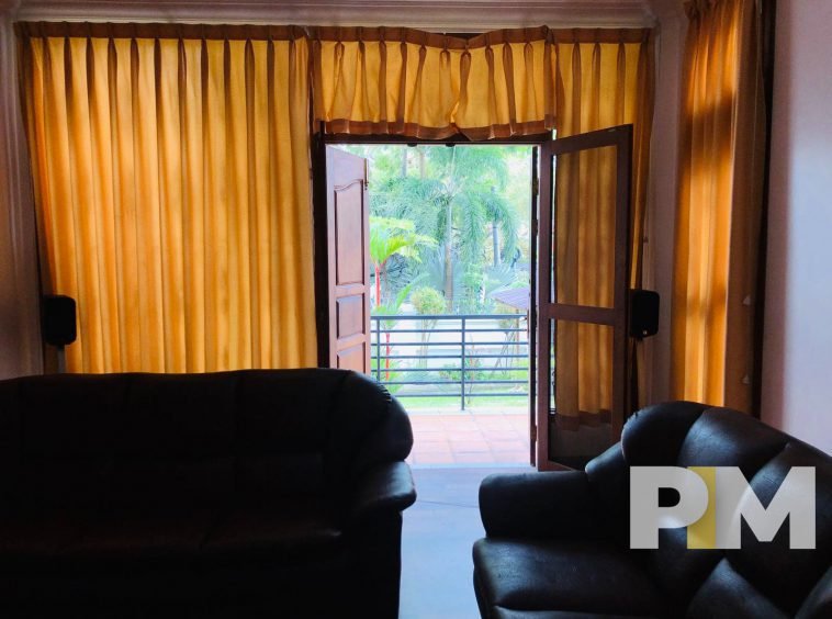 living room with balcony - property in Yangon