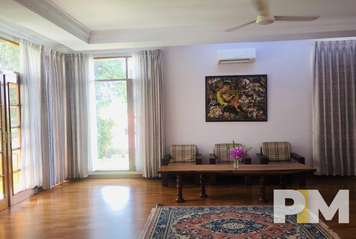 living room with ceiling fan - properties in Yangon