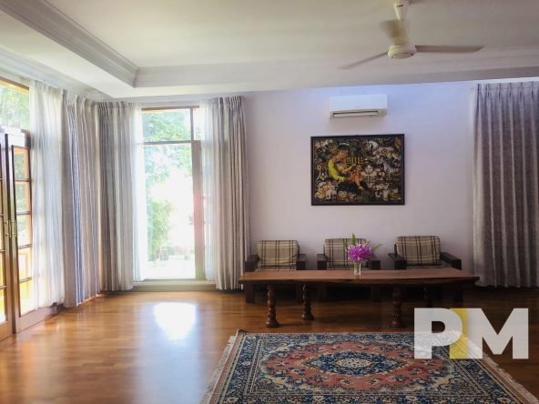living room with ceiling fan - properties in Yangon