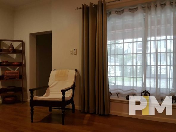 living room with chair - properties in Yangon