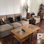 living room with coffee table - property in Yangon