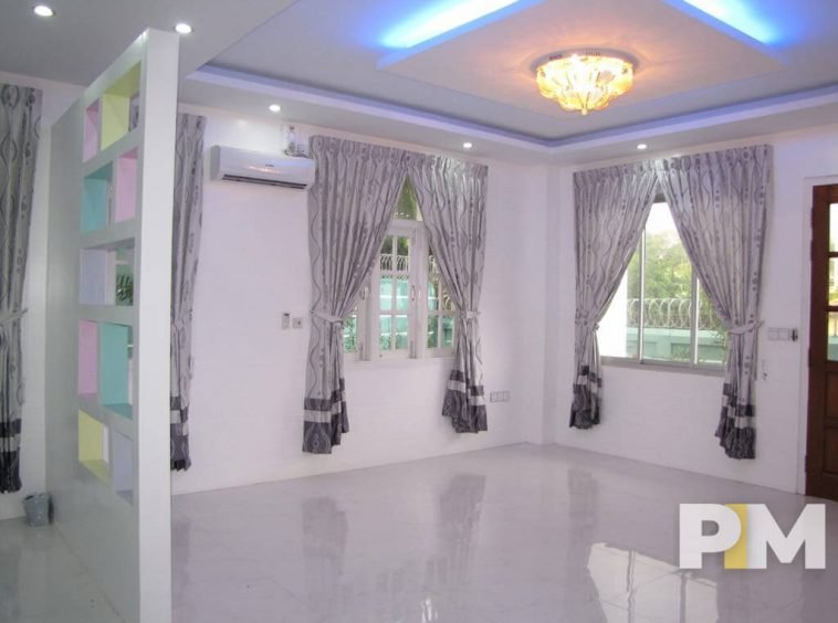 living room with curtains - property in Yangon