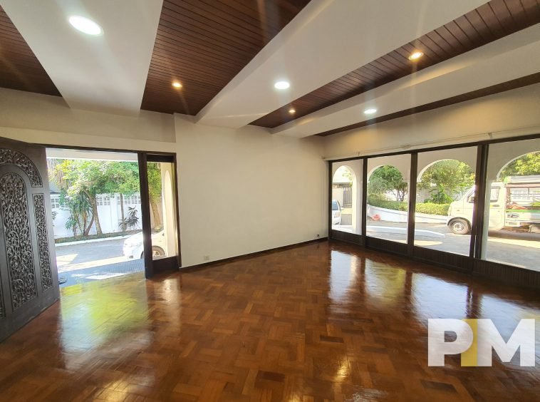 living room with entrance door - house for rent in Kamayut
