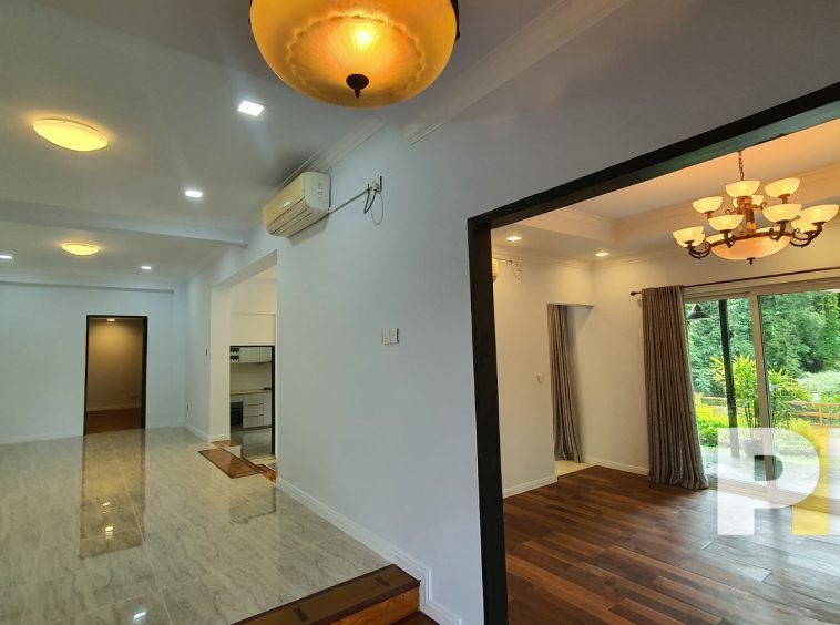 living room with hanging light - Home Rental Yangon