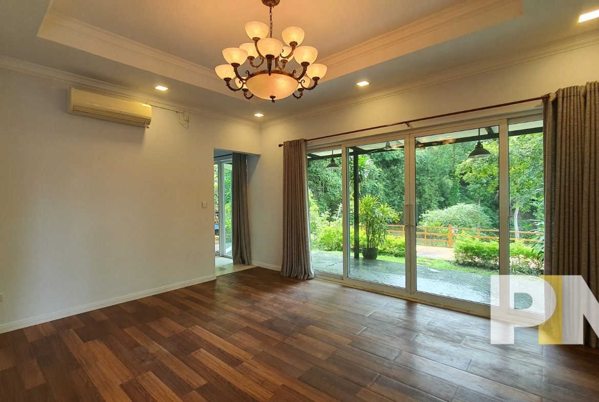living room with hanging light - Real Estate in Yangon