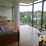 living room with large glass window - Yangon Real Estate