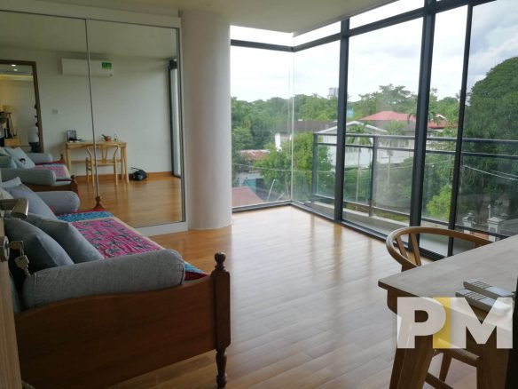 living room with large glass window - Yangon Real Estate