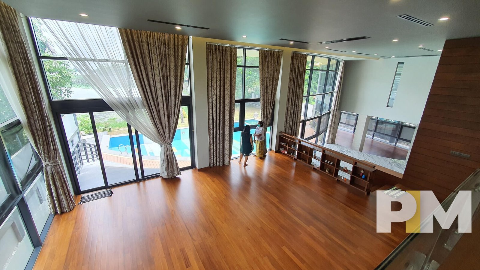 living room with long curtains - properties in Yangon