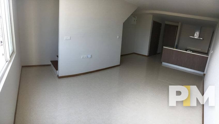 living room with open kitchen - Condo for rent in Hlaing