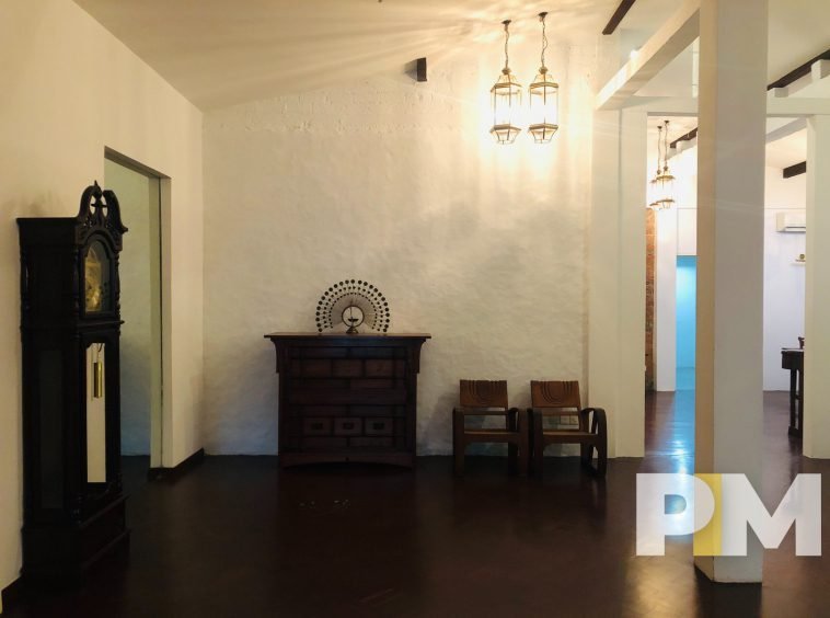 living room with pendulum clock - Home Rental Yangon