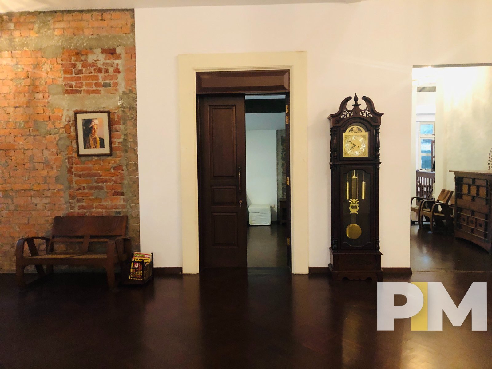 living room with pendulum clock - Rent in Yangon