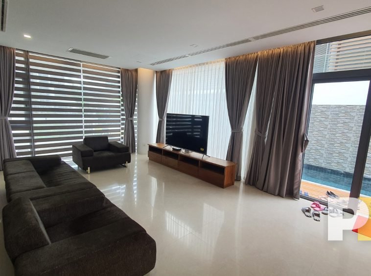 living room with sofa - property in Yangon