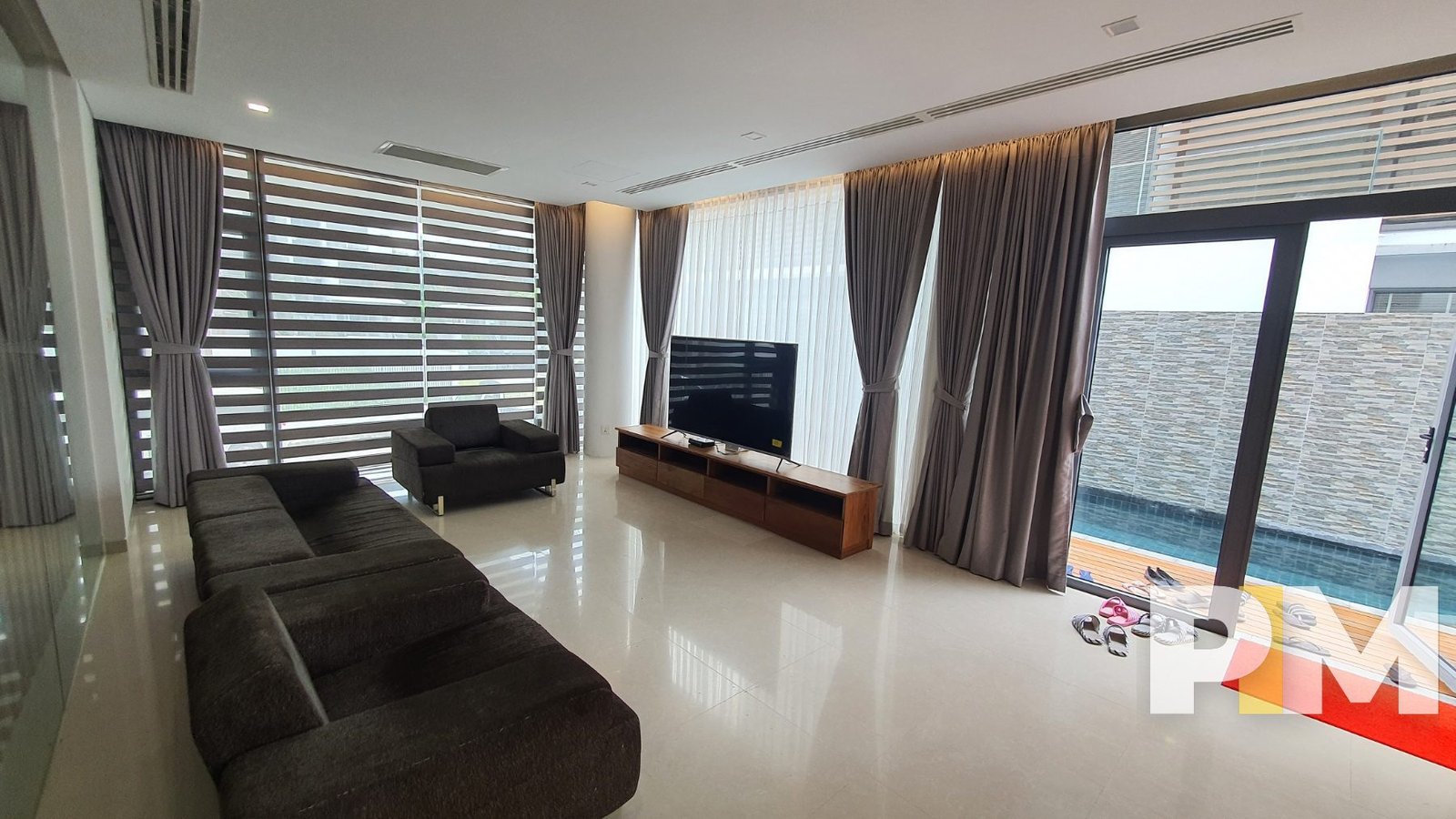 living room with sofa - property in Yangon