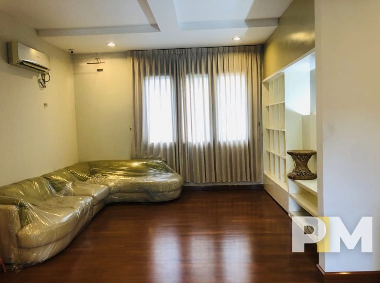 living room with sofa - property in Yangon