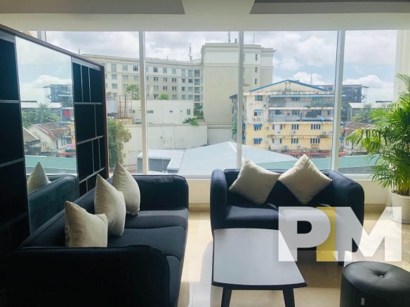 living room with sofa set - Condo for rent in Yawmingyi