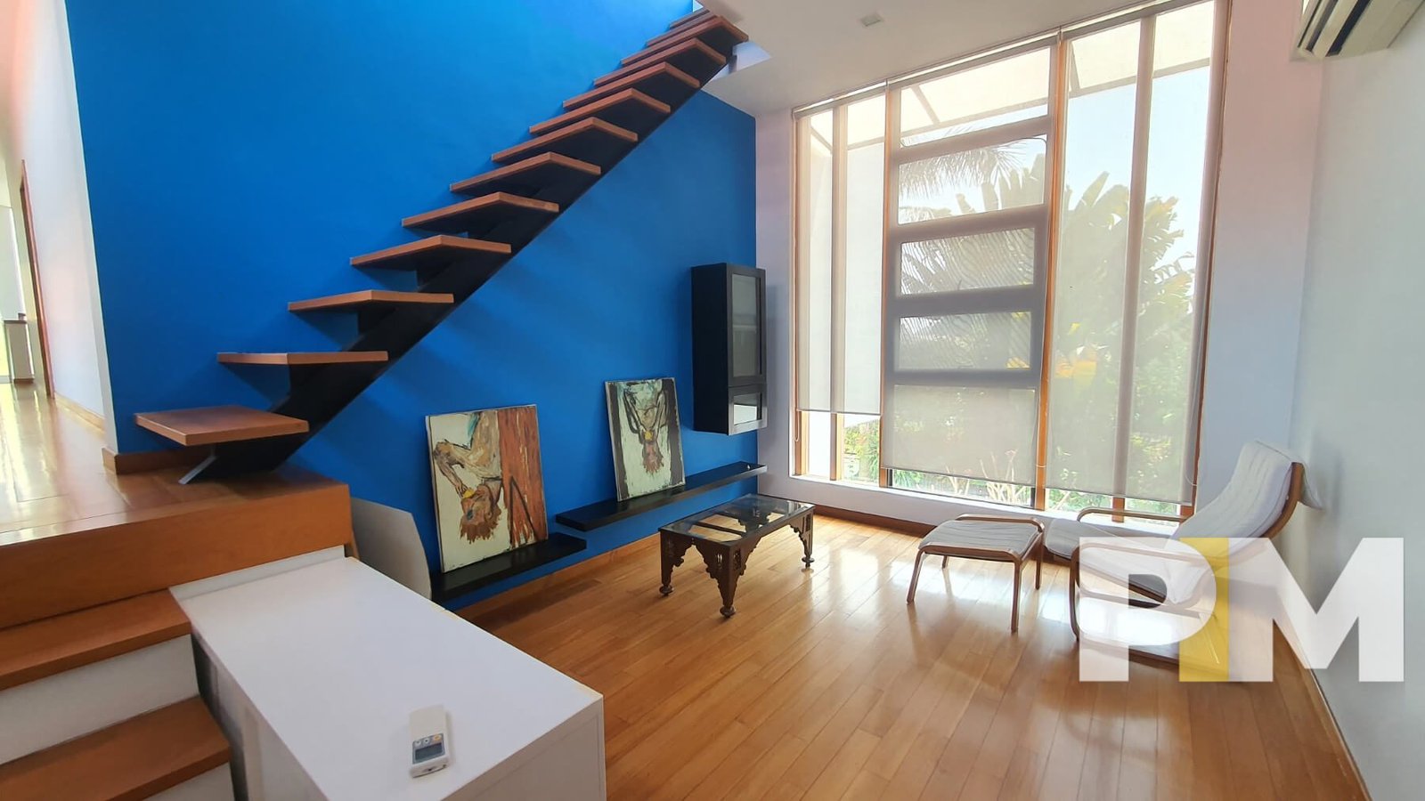 living room with staircase - properties in Yangon