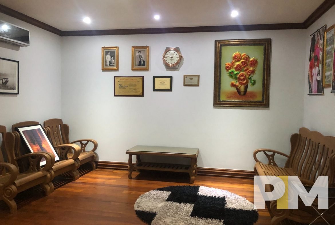living room with wooden chair set - Yangon Property
