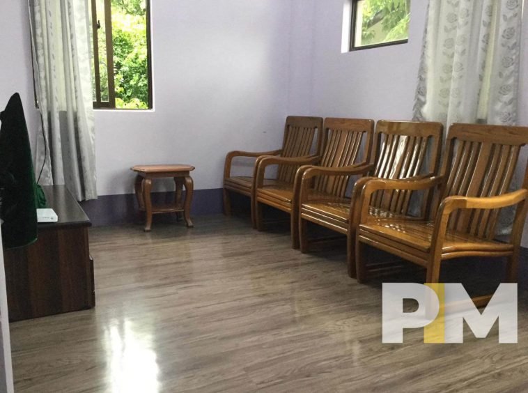 living room with wooden chairs - House for rent in Mayangone