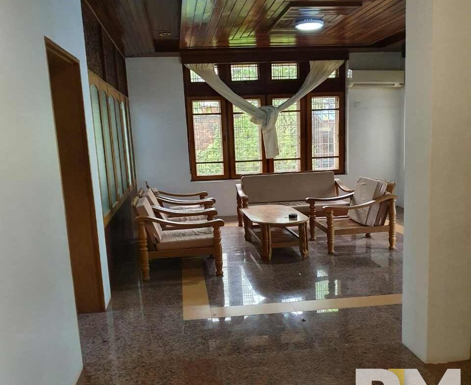 living room with wooden table and chairs - Yangon Property