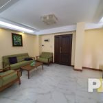 living room with wooden sofa - Real Estate in Yangon