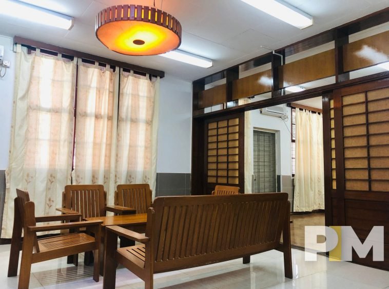 living room with wooden table and chairs - Myanmar Property