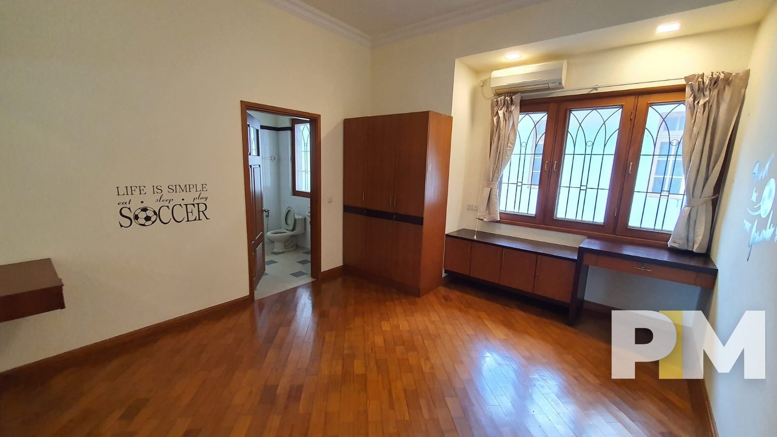 master bedroom with air conditioner - Home Rental Yangon