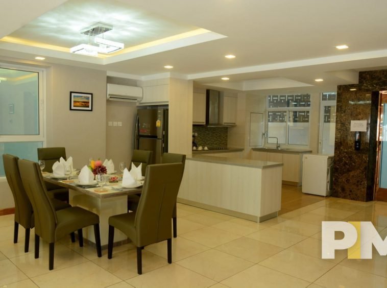 open kitchen with dining table and chairs - Rent in Yangon