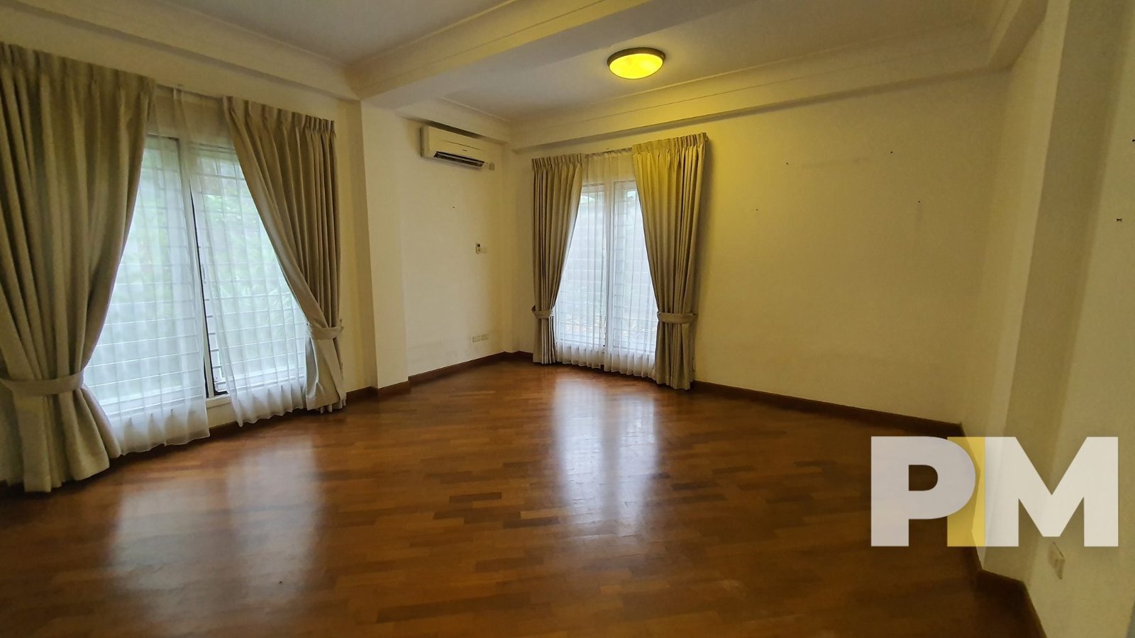 room with ceiling light - properties in Yangon