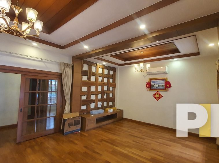 room with hanging light - Home Rental Yangon