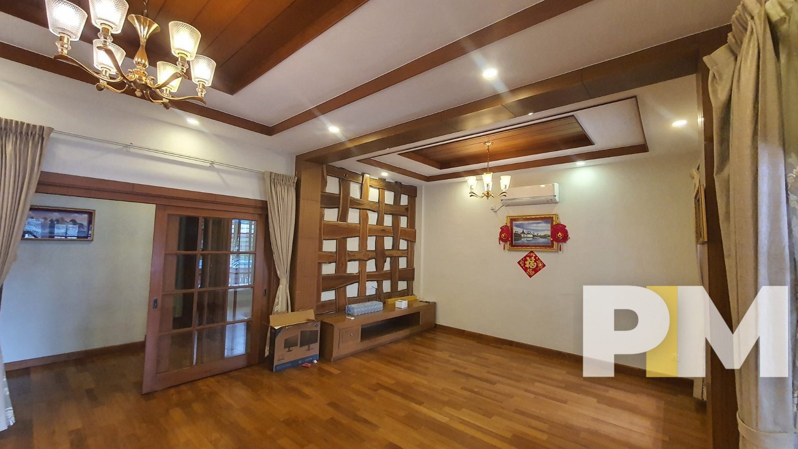 room with hanging light - Home Rental Yangon