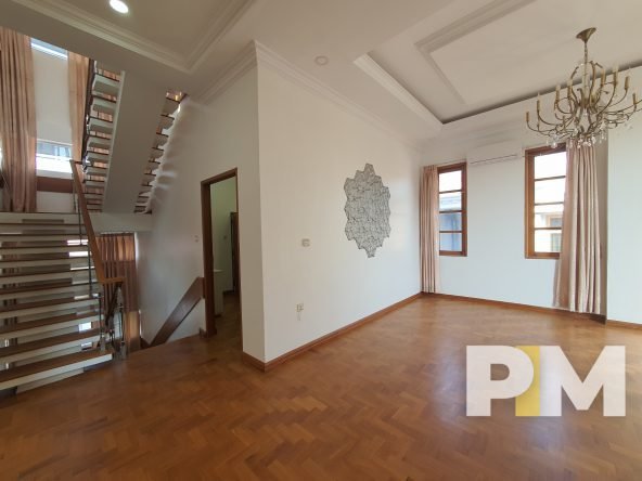 room with hanging light - Yangon Luxury House