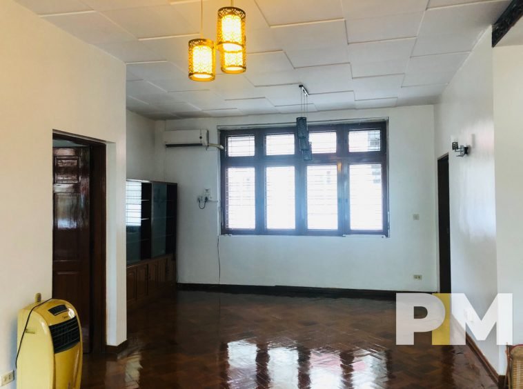 room with hanging light - Yangon Real Estate