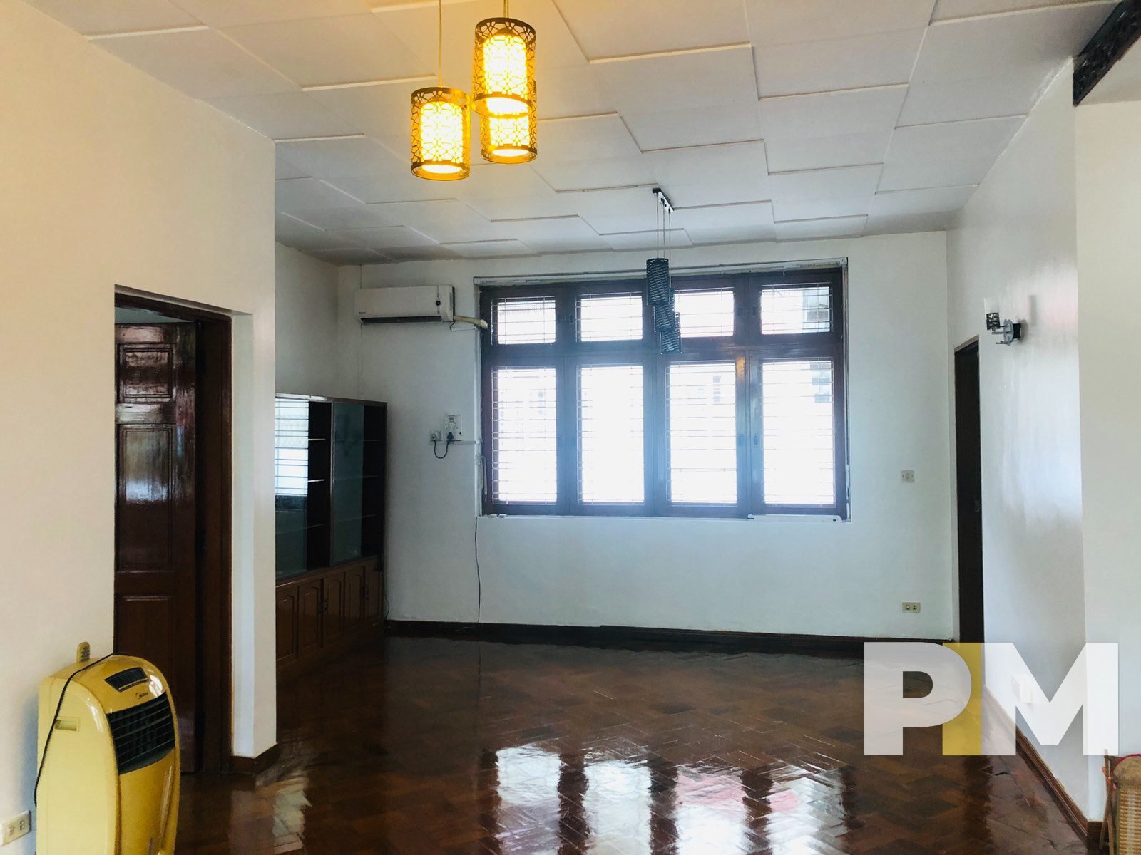 room with hanging light - Yangon Real Estate