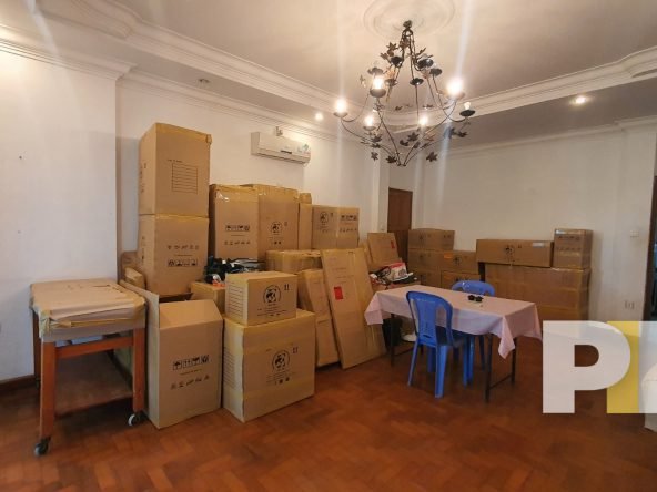 room with hanging light - properties in Yangon